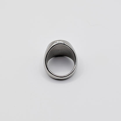 Alternative angle of thick stainless steel signet ring from the back perspective