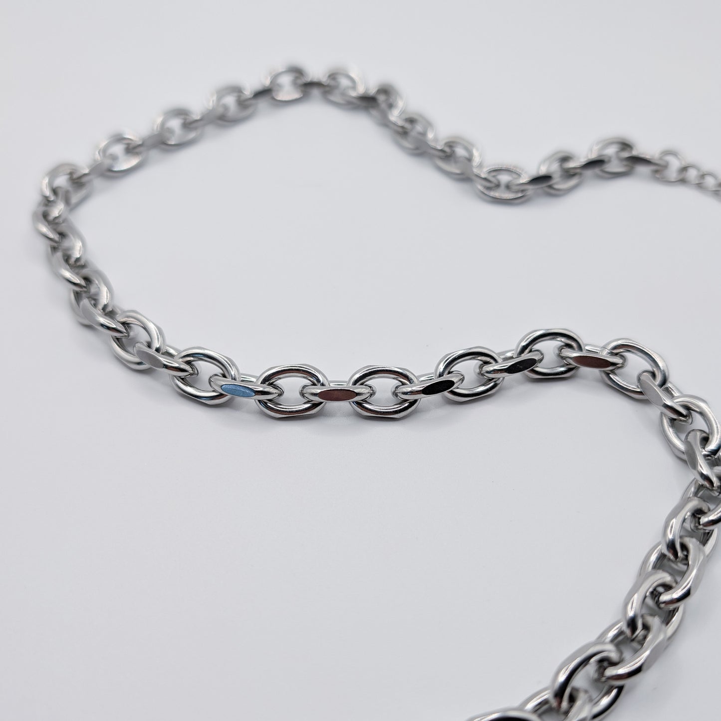 Close up of the stainless steel cable chain necklace.