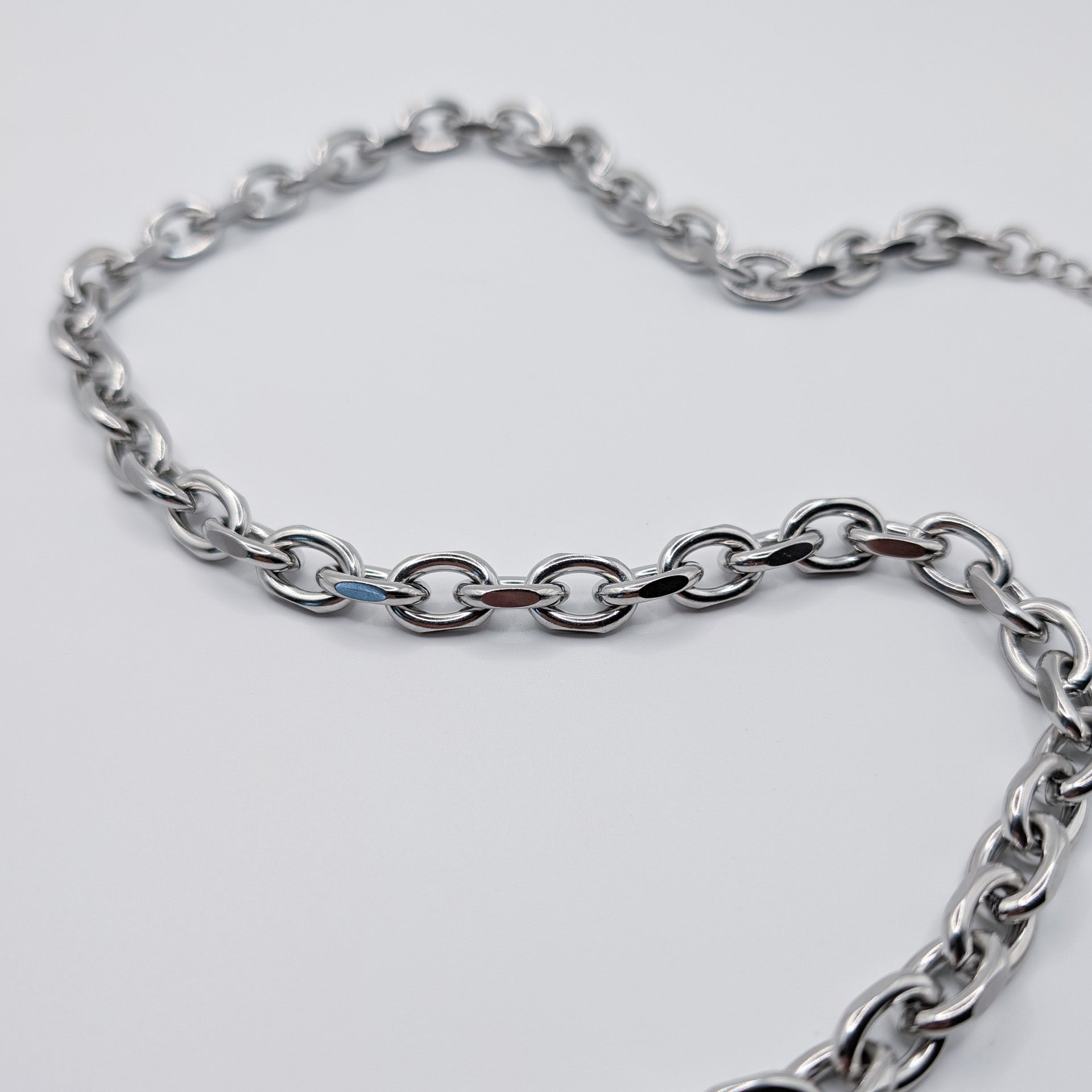 Close up of the stainless steel cable chain necklace.